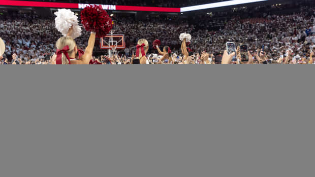 Razorback fans celebrating win over Duke in November 2023
